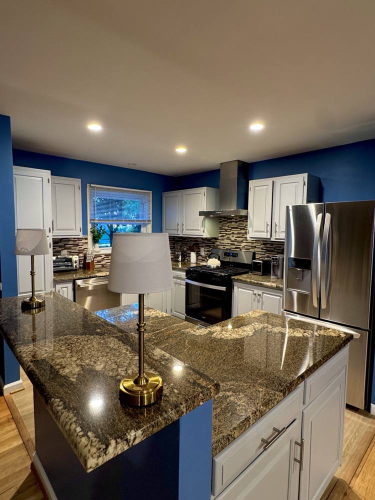 Kitchen with granite counters and stainless appliances